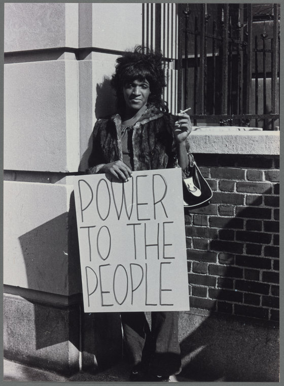 Marsha P. Johnson pickets Bellevue Hospital to protest the treatment of LGBTQ and those living on the street.